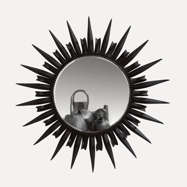 A Black Iron Sun Mirror from Quindry