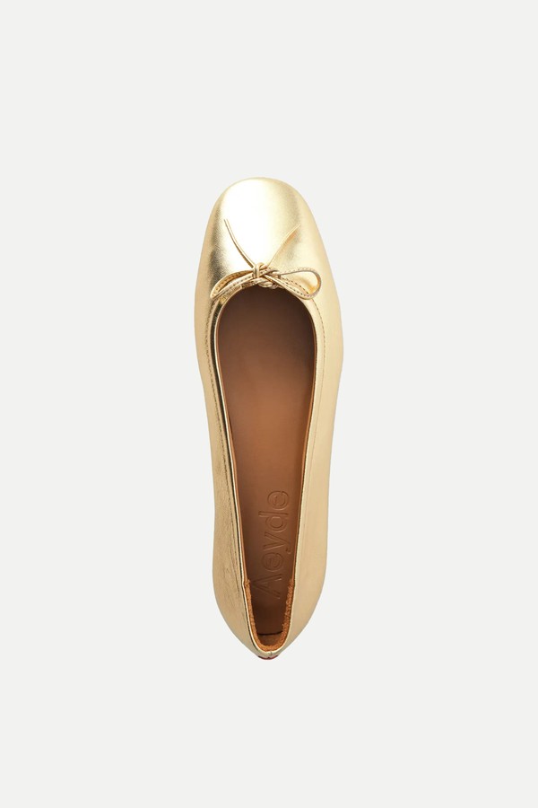 Bow-Embellished Metallic Leather Ballet Flats from Porte & Paire