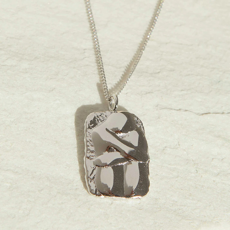 Embrace Pendant Necklace In Silver