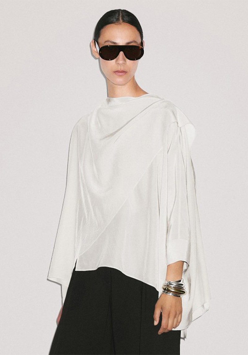 Short Flowing Cape With Sleeve Detail