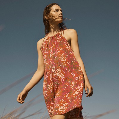 Tie-Detailed Printed Hammered-Satin Halterneck Mini Dress, £725 | Stella McCartney