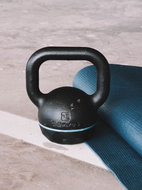 How To Use A Kettlebell & The Workouts To Try