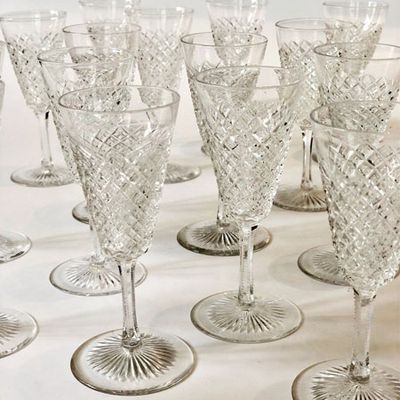Extensive Set Of 16 Diamond Cut Crystal Flutes from The Vintage Entertainer