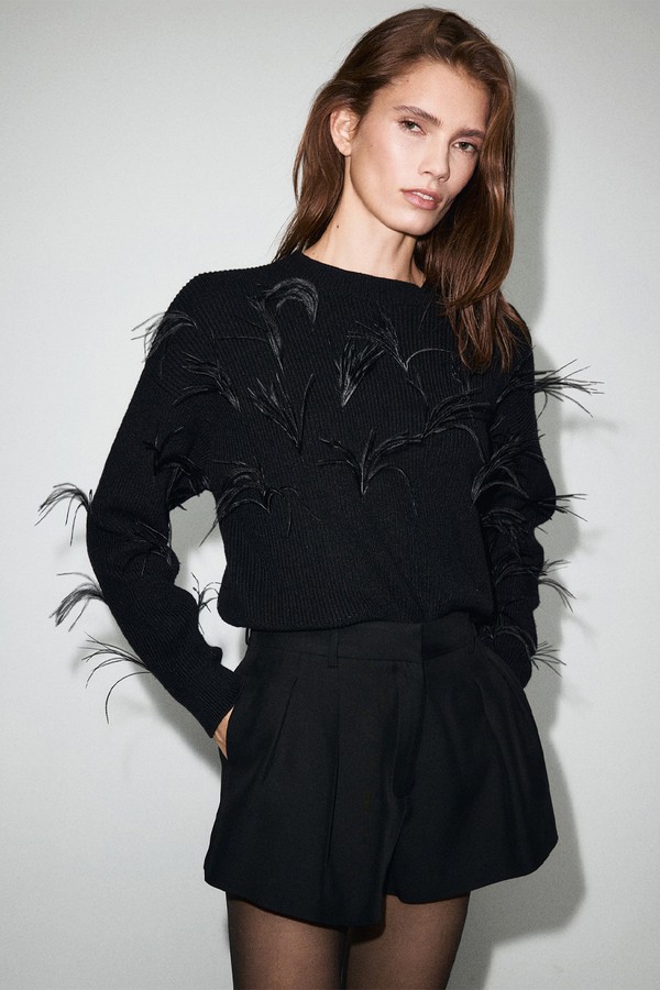 Knitted Sweater With Feathers