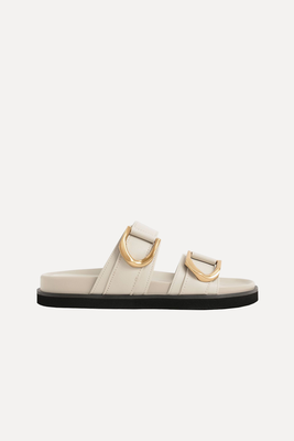 Gabine Buckled Leather Slides​ from Charles And Keith 