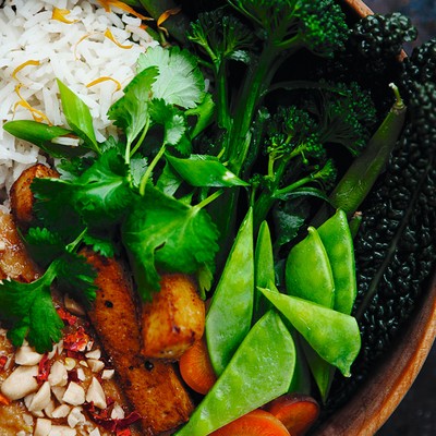 Rice Bowl With Steamed Vegetables And Peanut Sauce 