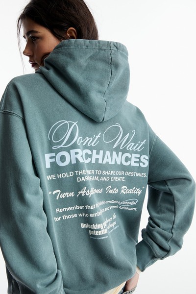 HOODIE WITH SLOGAN