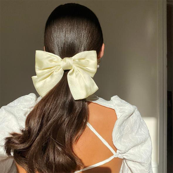 Ivory Oversized Bow Hair Clip from Anisa Sojka