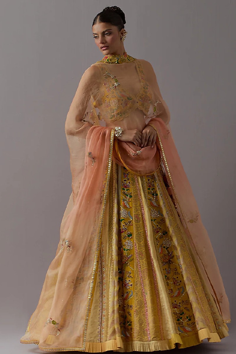 Mustard Silk Brocade & Banarasi Lehenga Set from Aum Ashima & Asit