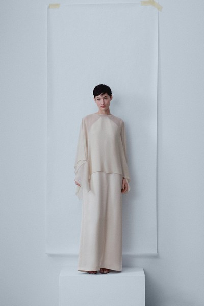 Asymmetric Semi-Transparent Cape