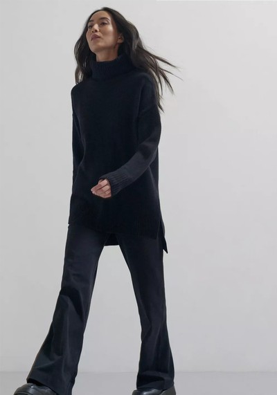 Relaxed Fit Premium Merino Wool Turtleneck With Split Hem