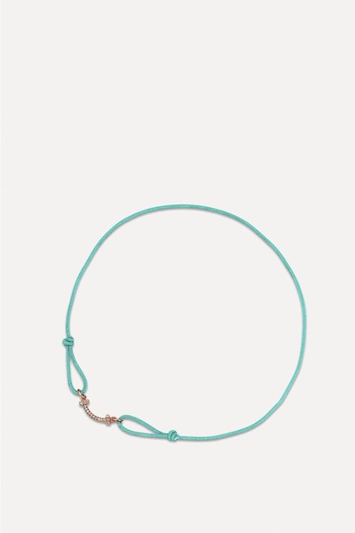 Smile Bracelet In Rose Gold On A Blue Cord With Diamonds