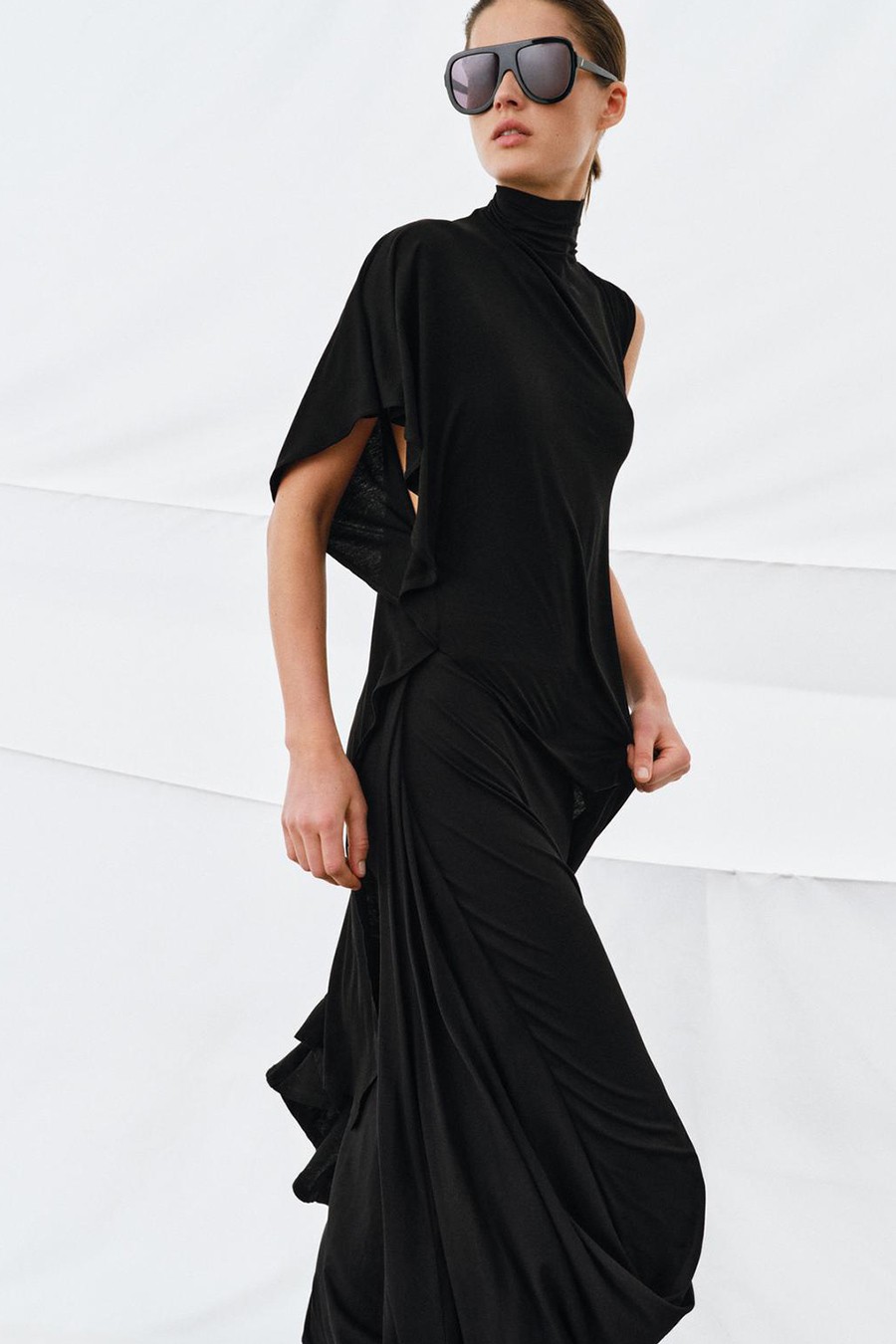 Draped Asymmetric Top