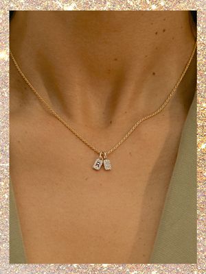 Tiny Diamond Alphabet Tag Pendant, £275 | Otiumberg