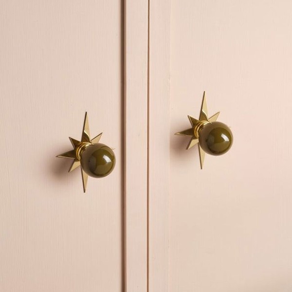 Star Backplate Polished Brass Doorknobs from MG & Co.