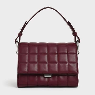 Burgundy Quilted Push Lock Handbag from Charles & Keith