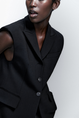 Long Black Buttoned Waistcoat from Massimo Dutti