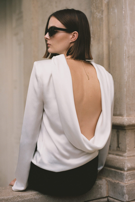 Open-Back Blouse With Shoulder Pads, £55.99 | Mango