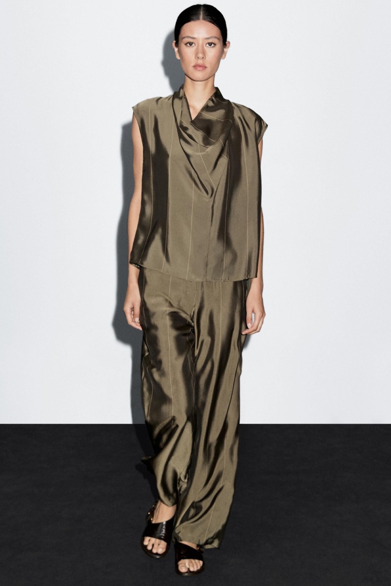 Flowing Trousers With Striped Details 