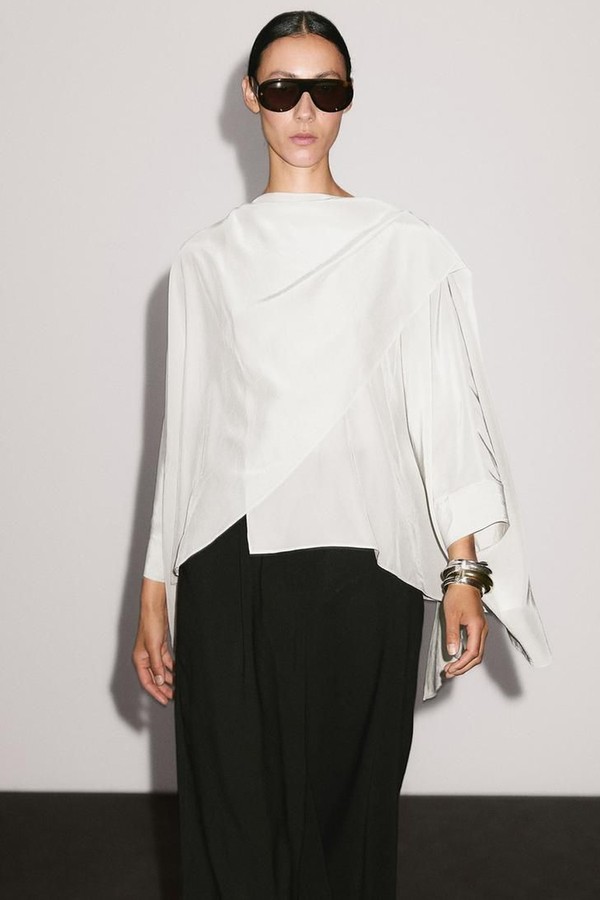 Short Flowing Cape With Sleeve Detail from MASSIMO DUTTI