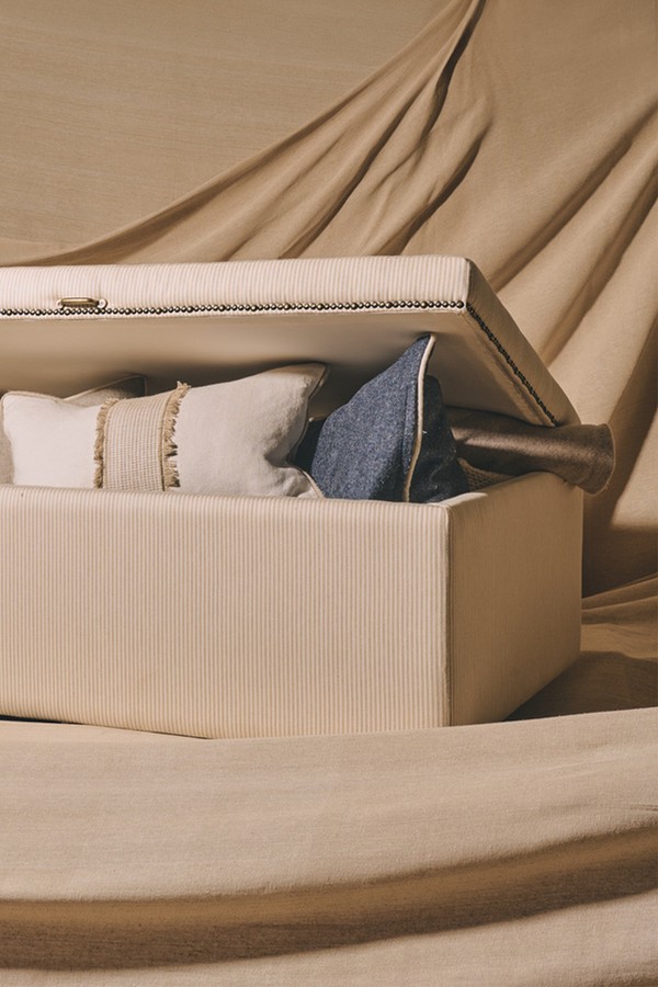 The Tumpty Upholstered Storage Ottoman from Hestia & Hearth