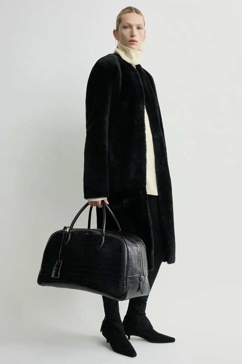 Croco-Embossed Traveler Bag from Toteme