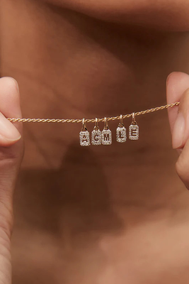 Solid Gold Tiny Diamond Alphabet Tag Pendant from Otiumberg