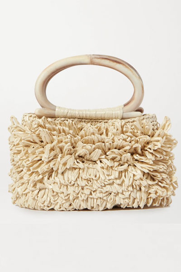 Corallina Ovale Fringed Raffia Tote from Carolina Santo Domingo