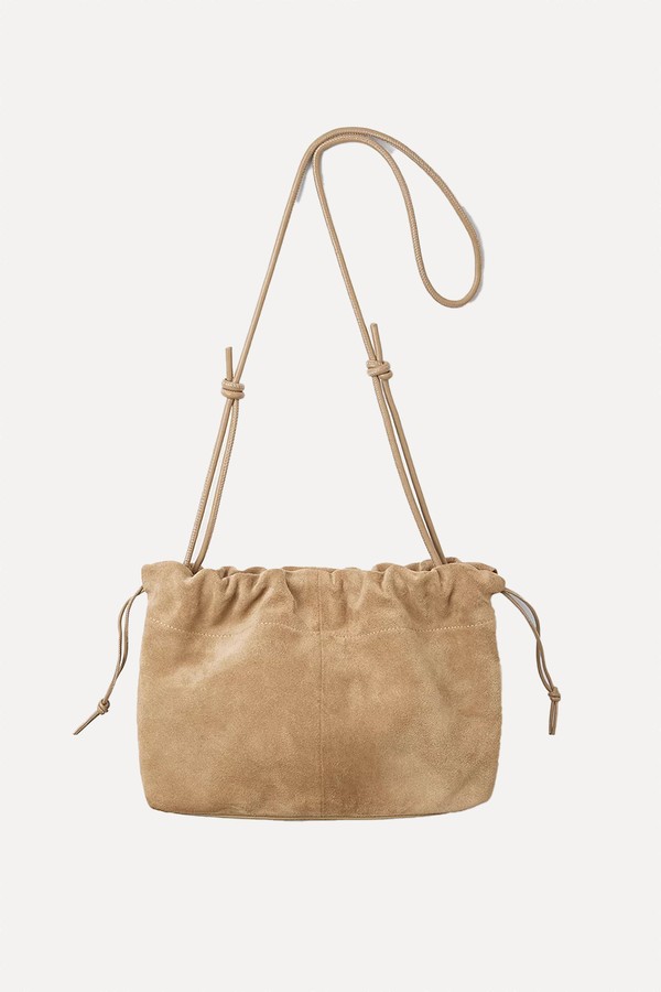x from Suede Drawstring Clutch, £150 | The White Company