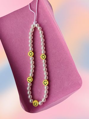 Pearl Smiley Phone Strap, £10.99 | By Mehshake