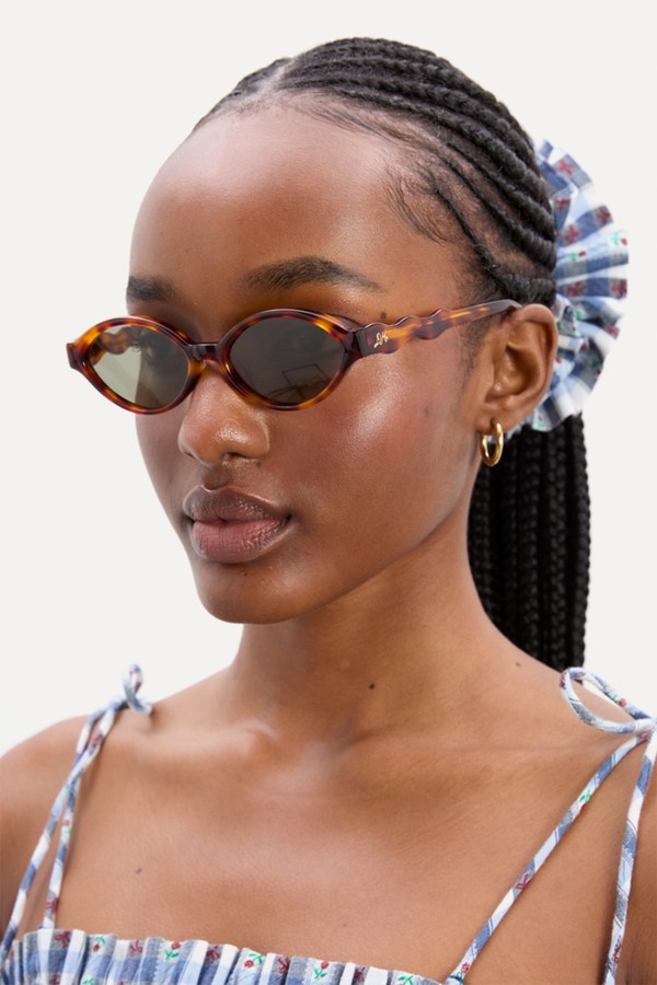 Slim Oval Sunglasses With Wavy Temple from Damson Madder