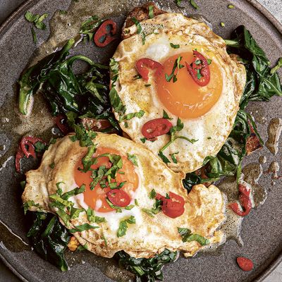 Fried Eggs And Spinach With Chilli And Parsley Butter
