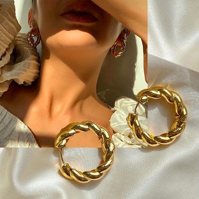 14 Pairs Of Twisted Hoop Earrings To Buy Now