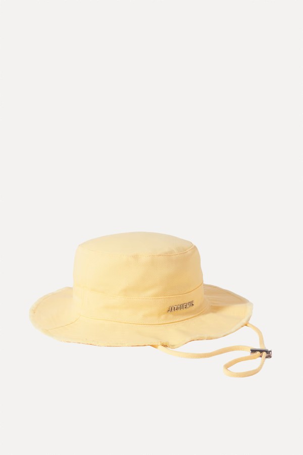 Artichaut Embellished Frayed Cotton-Twill Bucket Hat from JACQUEMUS