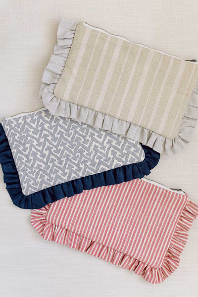 The Green Stripe Ruffled Pouch from Clementine & Mint