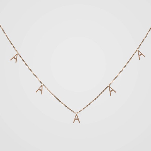 Charmed Letter Necklace  from Aurum + Grey 
