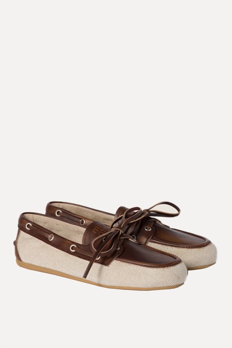 Canvas & Bleached Leather Boat Shoes from Miu Miu