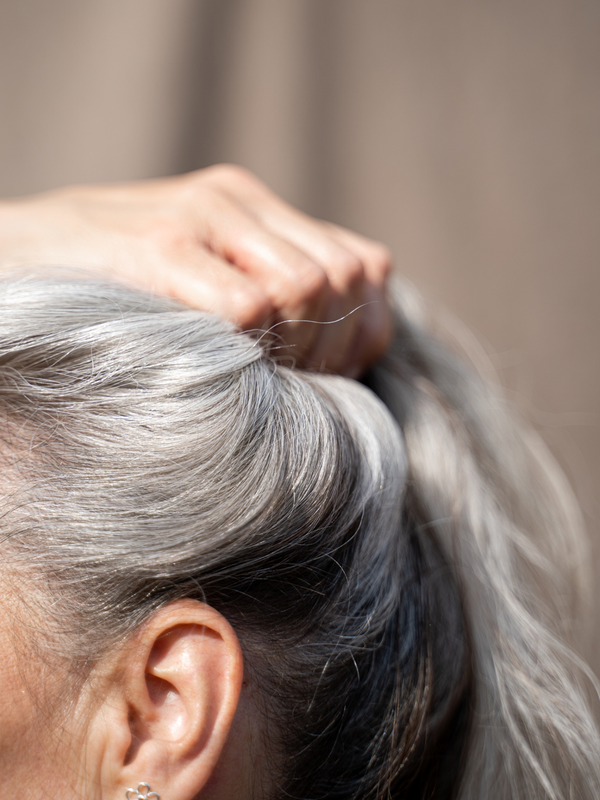 Your Top Hair Thinning Questions, Answered By A Trichologist