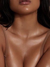 7 Shimmering Body Oils To See You Through Party Season