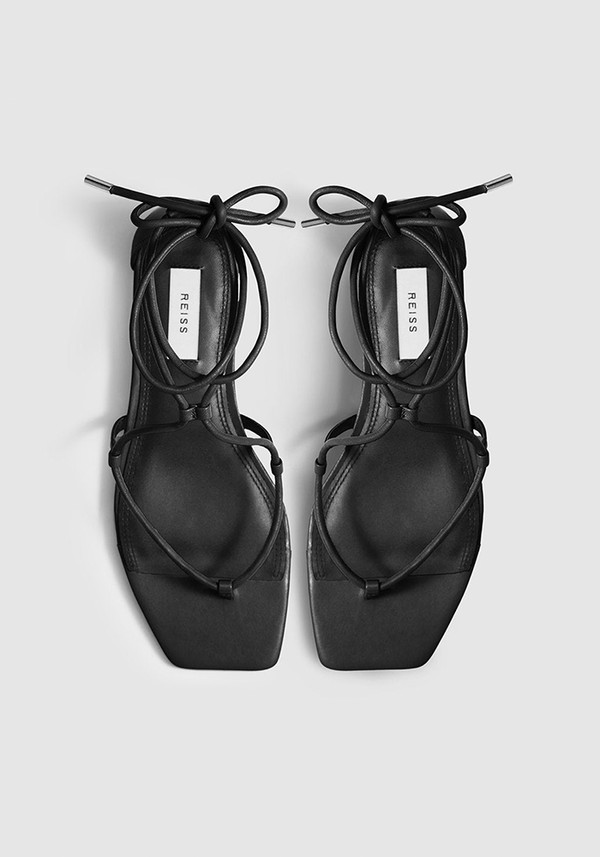 Kali Flat Black Leather Strappy Wrap Sandals from Reiss
