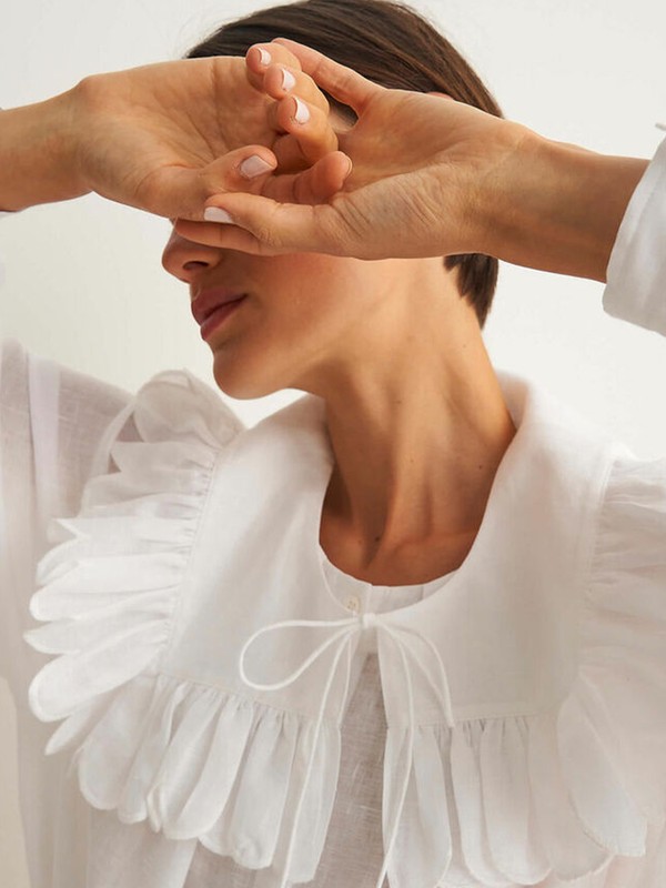 20 New White Blouses We Love