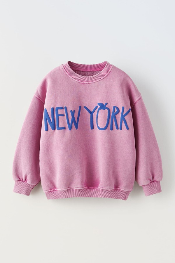 FADED SWEATSHIRT WITH SLOGAN