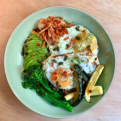 Sourdough with eggs, kimchi, avocado & veggies