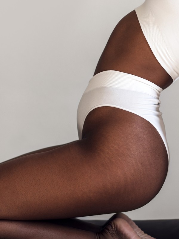 Black Woman In White Underwear by Stocksy Contributor Lucas Ottone -  Stocksy