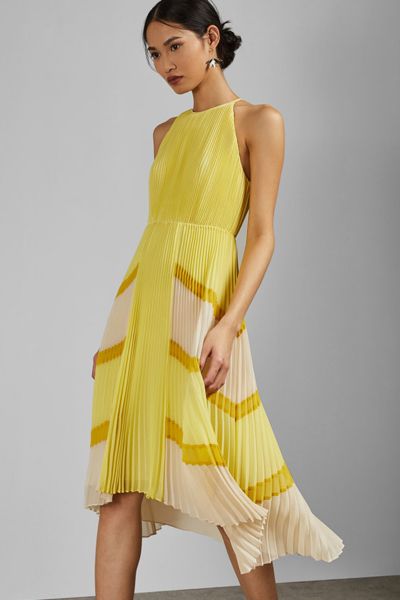 Nellina Dip Hem Pleated Dress