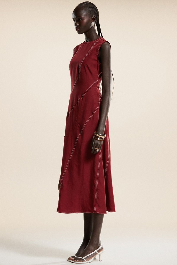Curved Contrast Stitch Midaxi Dress from Ghospell