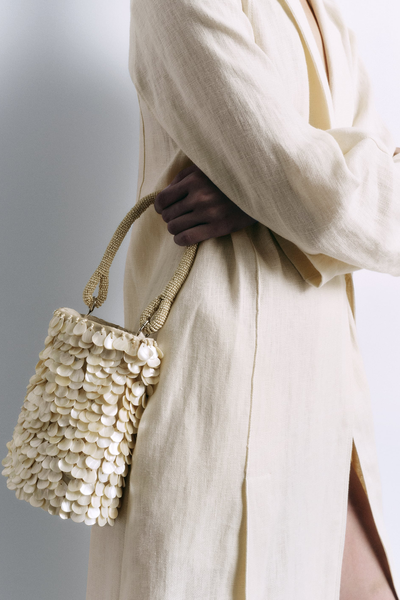 Beaded Mini Bucket Bag With Seashells. £49.99