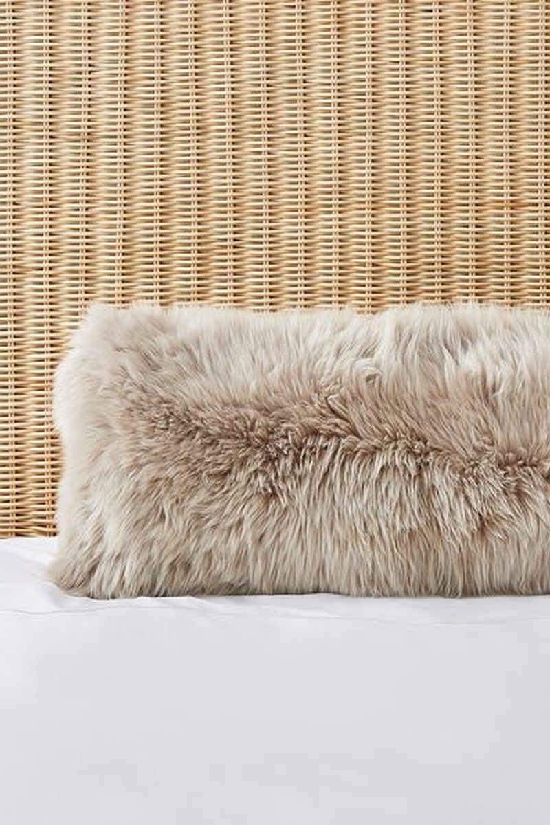 Dorma Natural Sheepskin Long Boudoir Cushion from dunelm